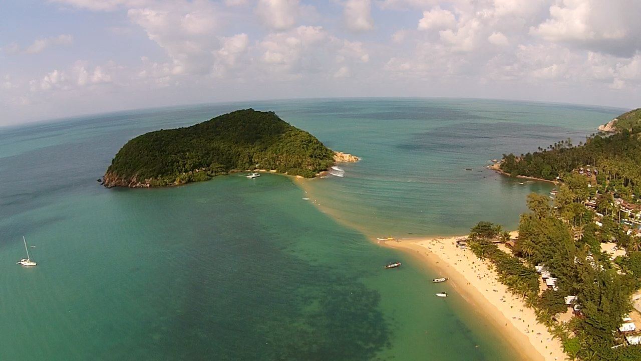 Koh Ma island off Mae Haad, Koh Phangan, at high tide with the sandbar covered by the sea